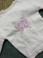 ⁦ريمو مليتون وسط فراشات⁩ - الصورة ⁦5⁩