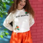 سيلا ابيض ف شورت اورنج